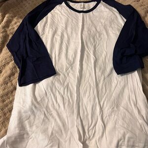 Top pro quarter length sleeve shirt. Navy blue and white, size 2XL